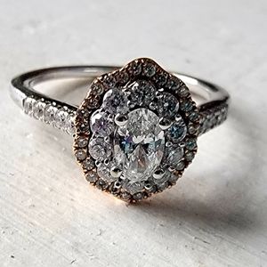 Certified oval diamond engagement ring